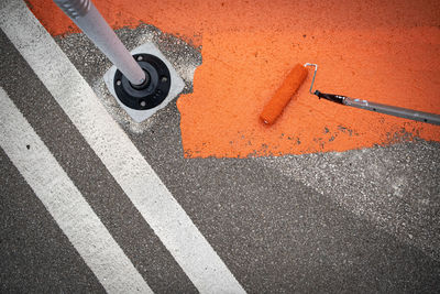 High angle view of arrow sign on street