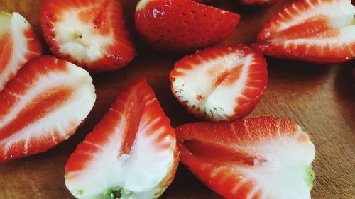 High angle view of strawberries on table