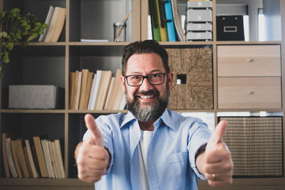 Portrait of smiling man at home