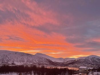 Scenic view of mountains against sky during sunset
