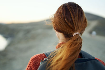 Rear view of woman looking at sea