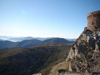 Scenic view of mountains against clear sky