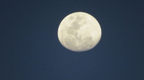 Low angle view of moon in sky