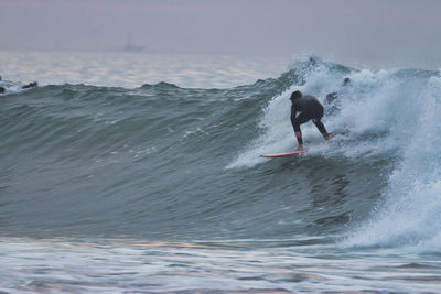 Man surfing in sea