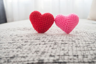 Close-up of heart shape decorations on table