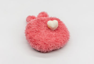 Close-up of heart shape over white background