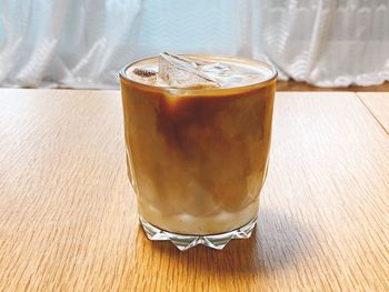 High angle view of ice tea on table