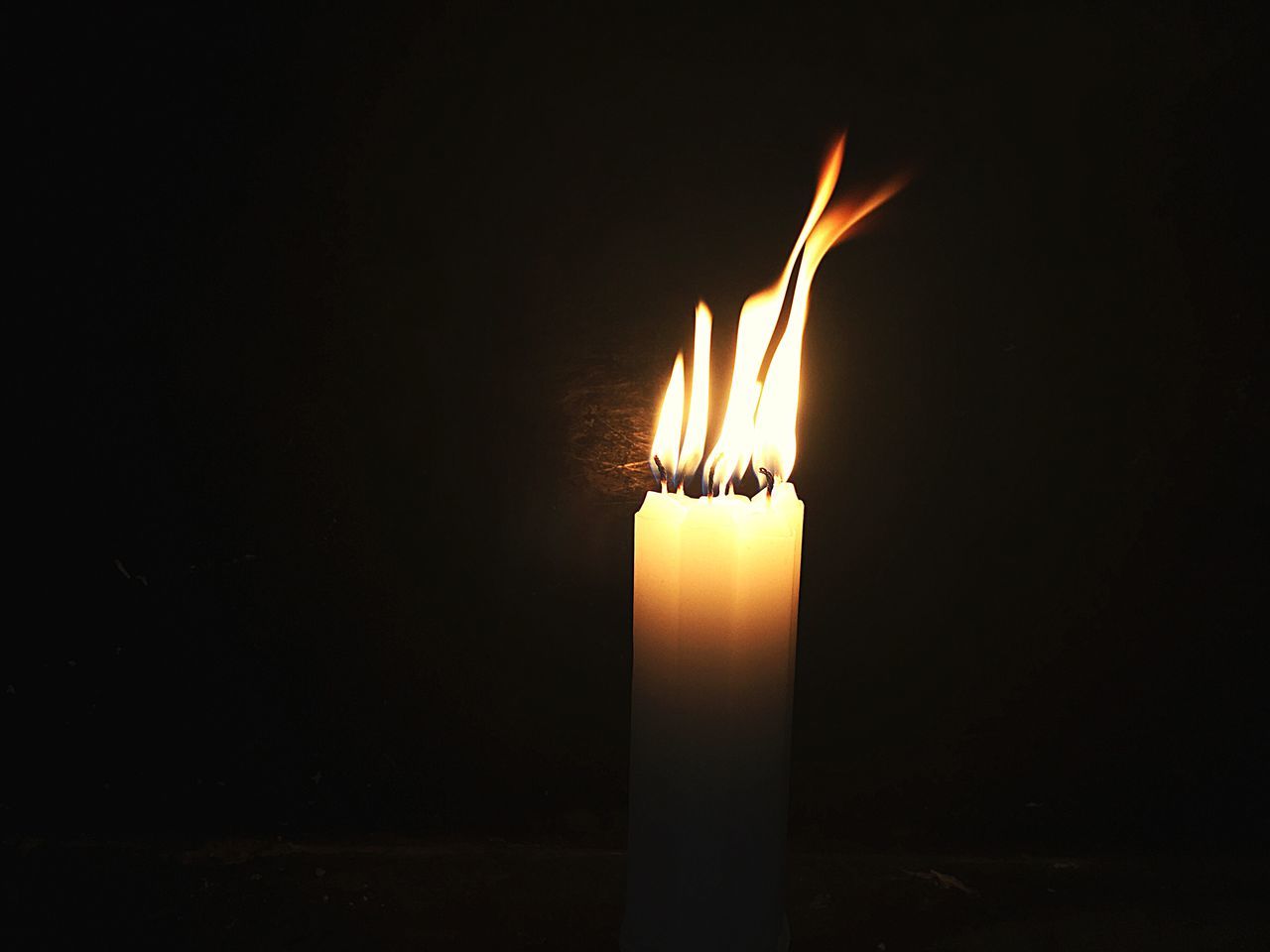 flame, burning, fire - natural phenomenon, candle, heat - temperature, glowing, illuminated, night, copy space, no people, close-up, indoors, black background, diya - oil lamp