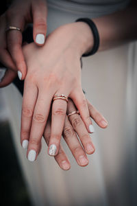 Cropped hand of woman with nail polish