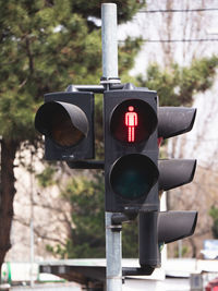 Close up of illuminated red light for pedestrians traffic light