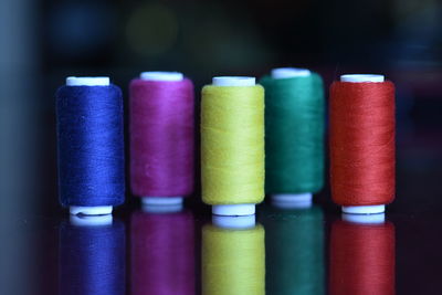 Close-up of multi colored spools