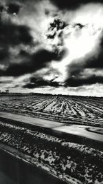 Scenic view of dramatic sky over land