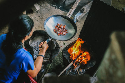 High angle view of woman preparing food