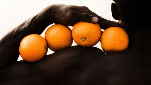 High angle view of orange fruits on table