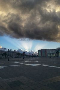 Storm clouds over cloudy sky