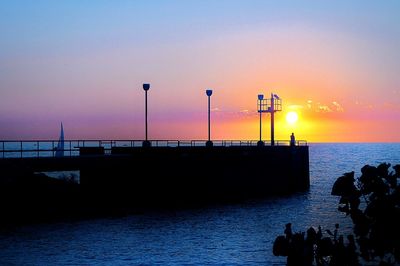 Scenic view of sea at sunset