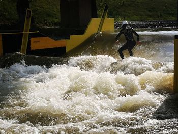 Man surfing in water