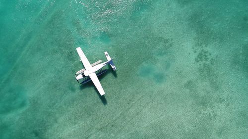 High angle view of seaplane in sea