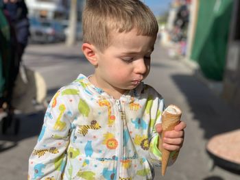 Boy holding ice cream