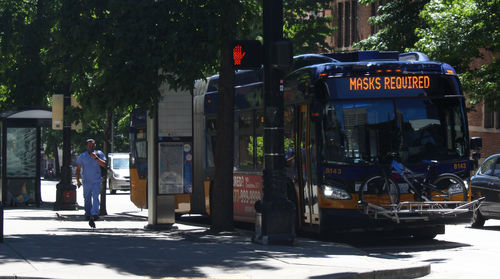 People walking on street in city