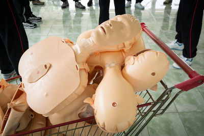 Close-up of cpr dummy on trolley