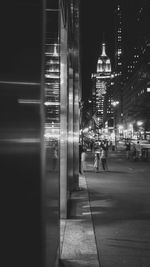 Blurred motion of vehicles on road at night