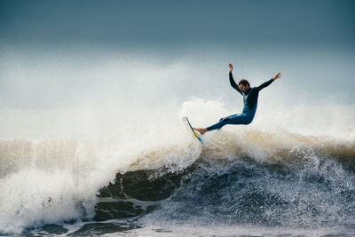 Man surfing in sea