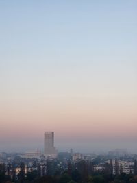 Aerial view of townscape against clear sky