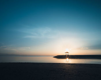 The early morning sun warms of bali island