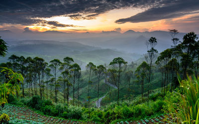 Scenic view of mountains against sky during sunset