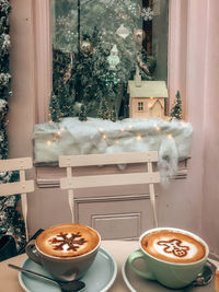 Coffee cup on table at home