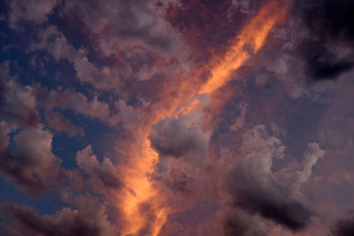 Low angle view of dramatic sky during sunset