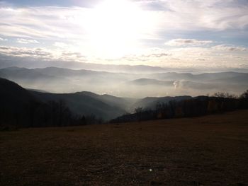 Scenic view of landscape against sky during sunset