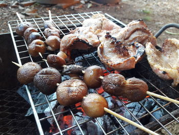 Close-up of sausages on barbecue grill