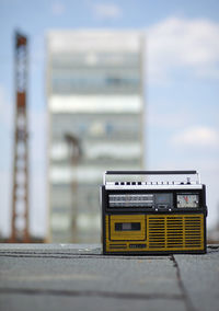 Retro cassette tape against building