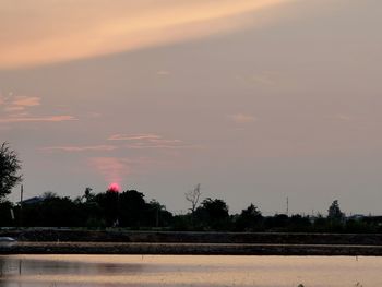 Scenic view of landscape against sky during sunset