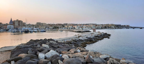 Romantic panorama of syracuse at sunset