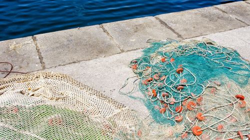 High angle view of fishing net on swimming pool