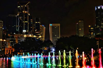 View of swimming pool at night