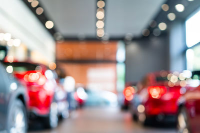 Defocused image of illuminated city street