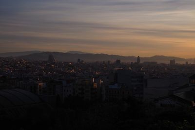 High angle view of townscape against sky at sunset