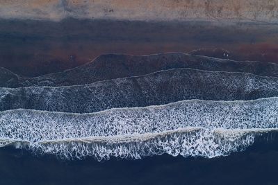 Aerial view of mountains against sky