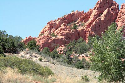 Scenic view of rocky mountains against clear sky