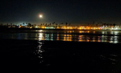 View of city lit up at night