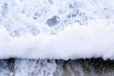 Close-up of wave splashing water