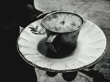 High angle view of coffee cup on table