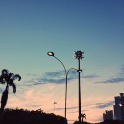 Low angle view of street light against sky