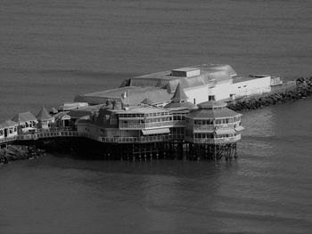 High angle view of harbor by sea against sky