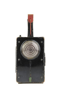 Close-up of camera against white background