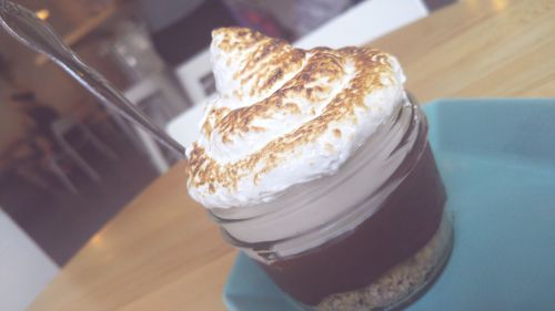 Tilt shot of fresh dessert on table at cafe